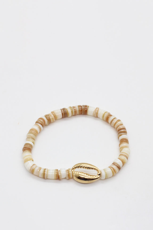 heist shell and gold cowrie shell
