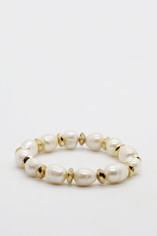 large freshwater pearl with gold discs