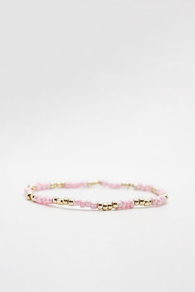 gold and pink anklet